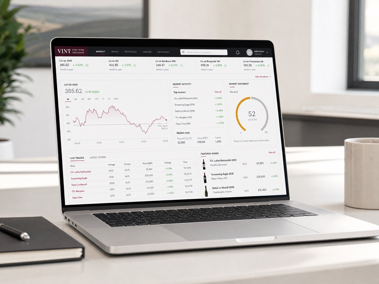A fine-wine trading marketplace dashboard on a laptop